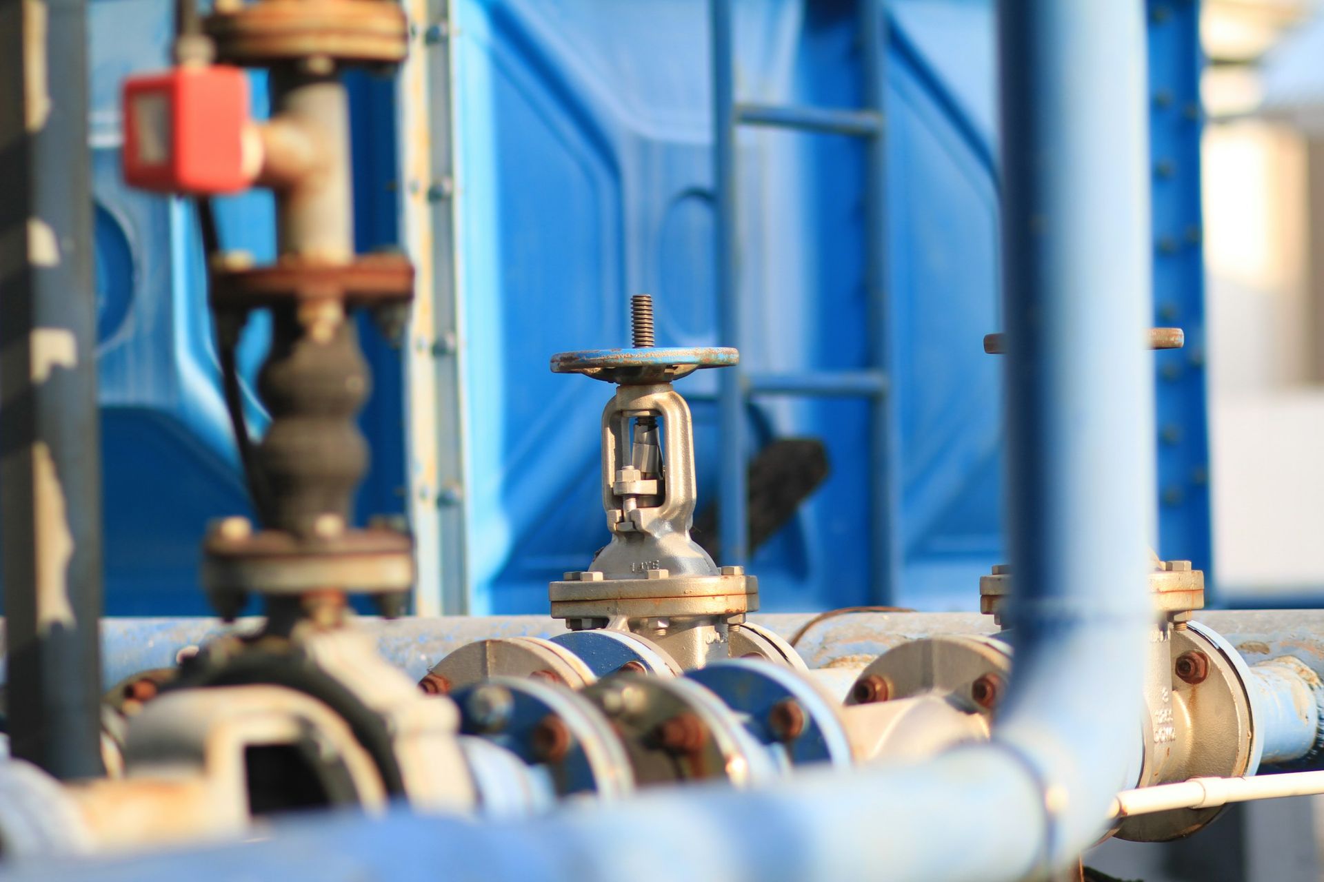 Valves on blue process piping
